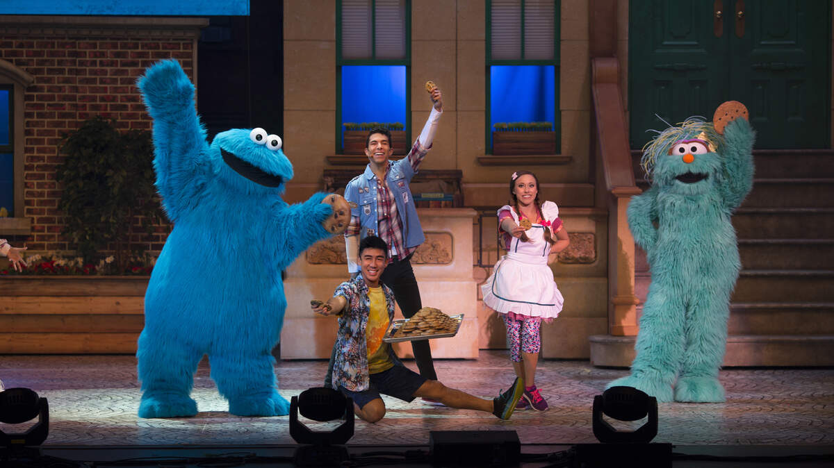 Cookie Monster and friends dance along to the “C is for Cookie” song.