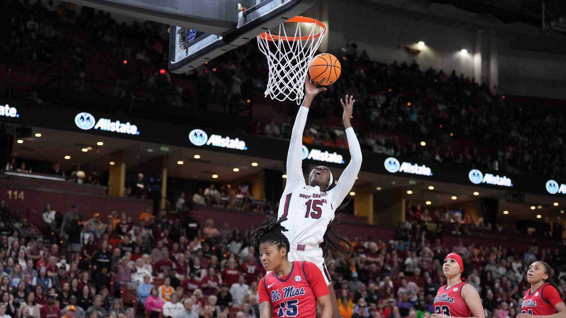 South Carolina Gamecocks forward Laeticia Amihere (15) shoots the ball over Ole Miss Rebels guard Angel Baker (15) in the first half Saturday at Bon Secours Wellness Arena.