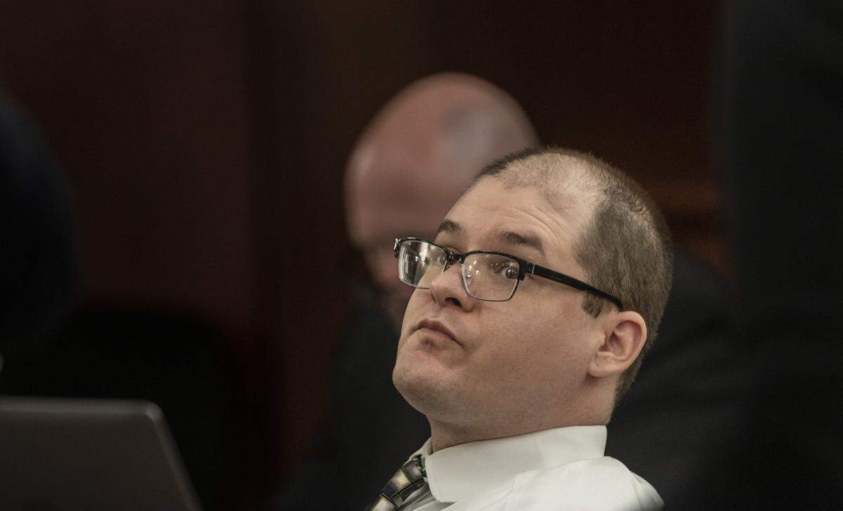 Tim Jones looks around the courtroom during his trial in Lexington on Monday. He is accused of killing his five young children in 2014 and faces the death penalty. 5/20/19
