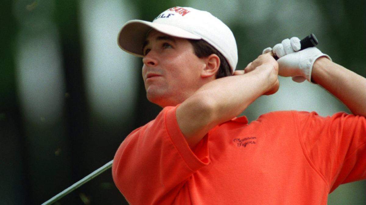 From 1997, Charles Warren of Clemson hits his second shot on the 18th hole on his way to a victory in the NCAA Division I men’s golf championship at the Conway Farms Golf Club in Lake Forest, Illinois.