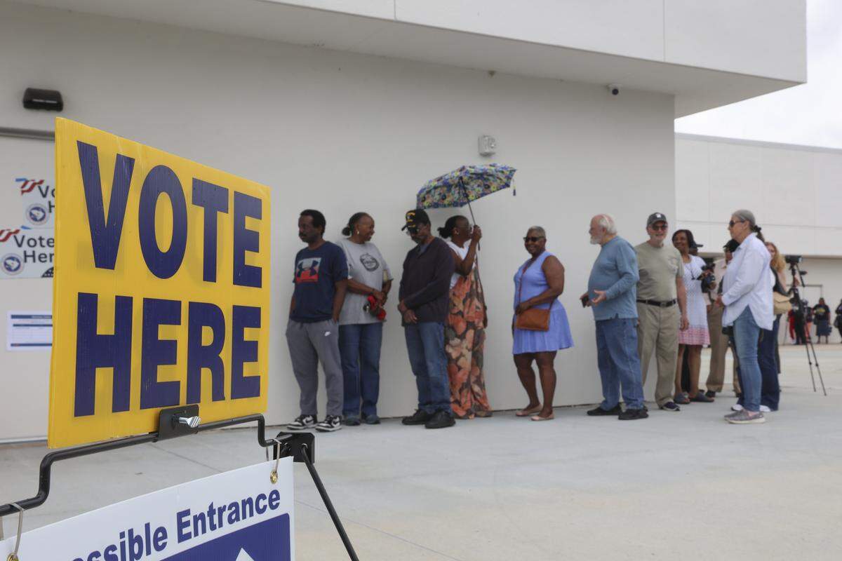People wait in line to vote on the first day of early voting on Tuesday, May 26, 2026, at the Richland County voter registration office at Richland Mall.