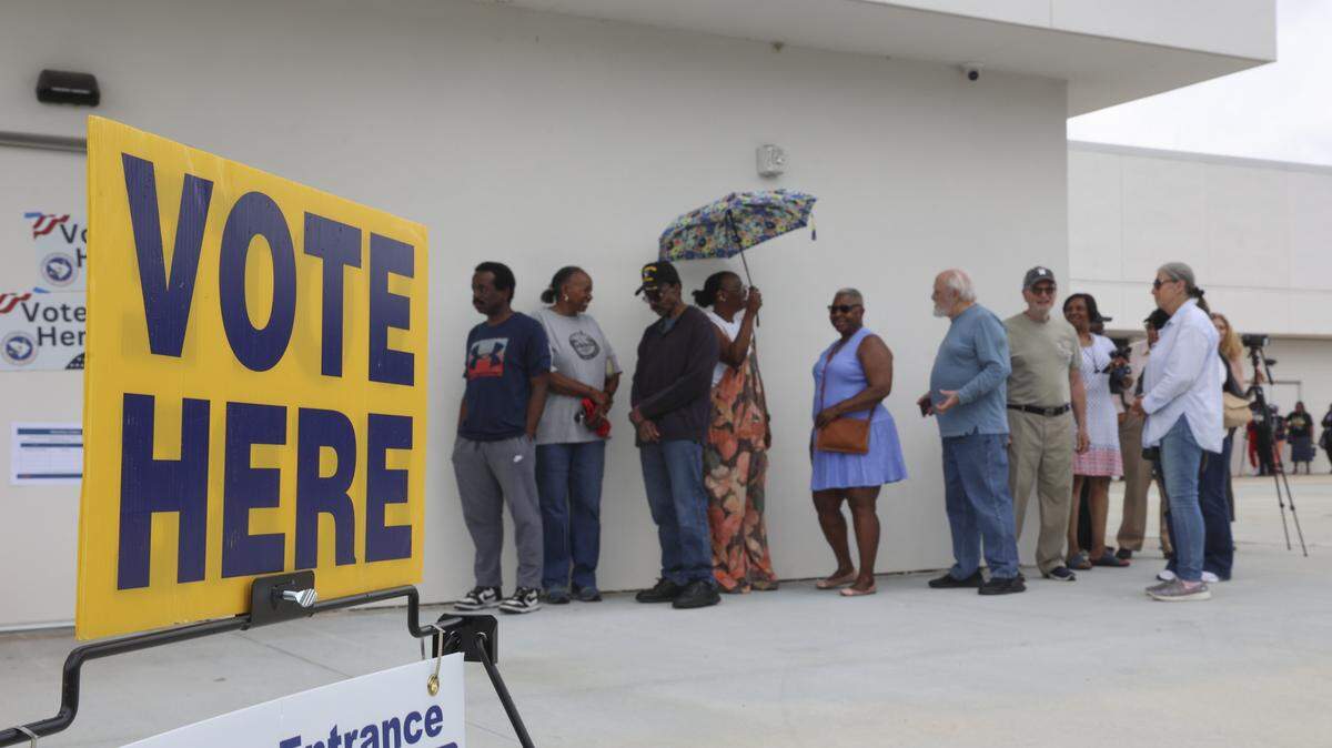 People wait in line to vote on the first day of early voting on Tuesday, May 26, 2026 at the Richland County Voter Registration office at Richland Mall.