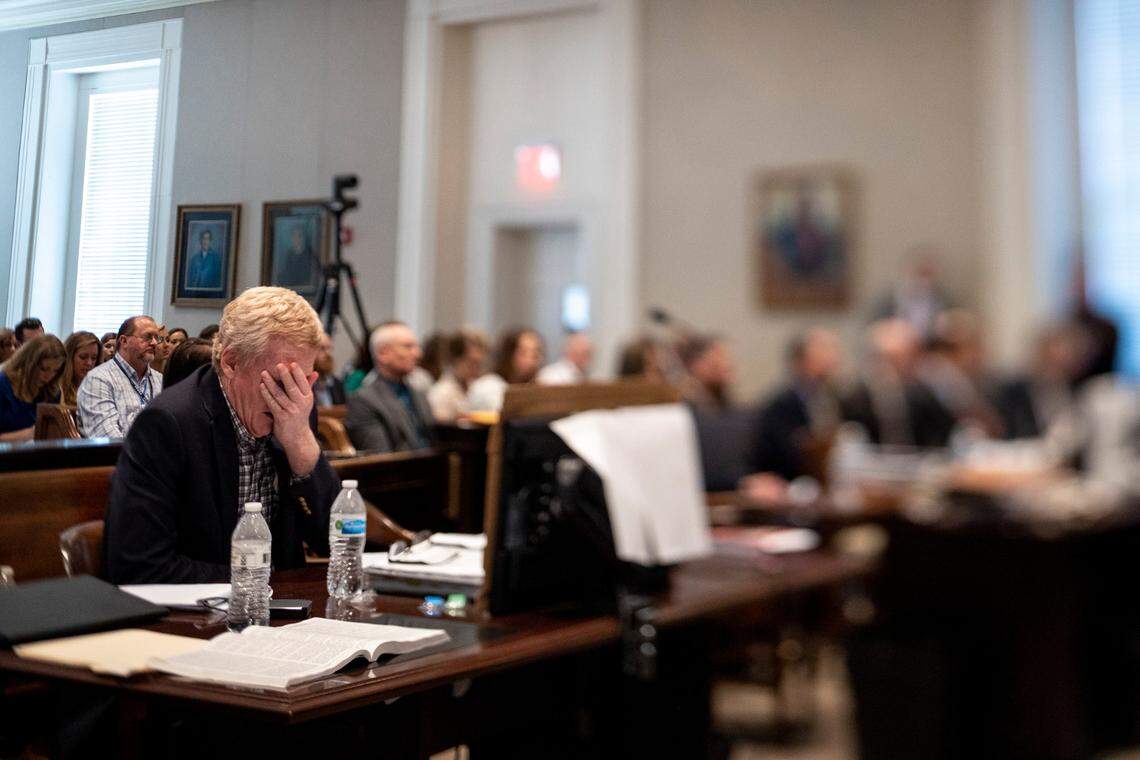 Alex Murdaugh covers his face during the Alex Murdaugh double murder trial at the Colleton County Courthouse in Walterboro on day 25 of Monday, Feb. 27, 2023. Andrew J. Whitaker/The Post and Courier/Pool
