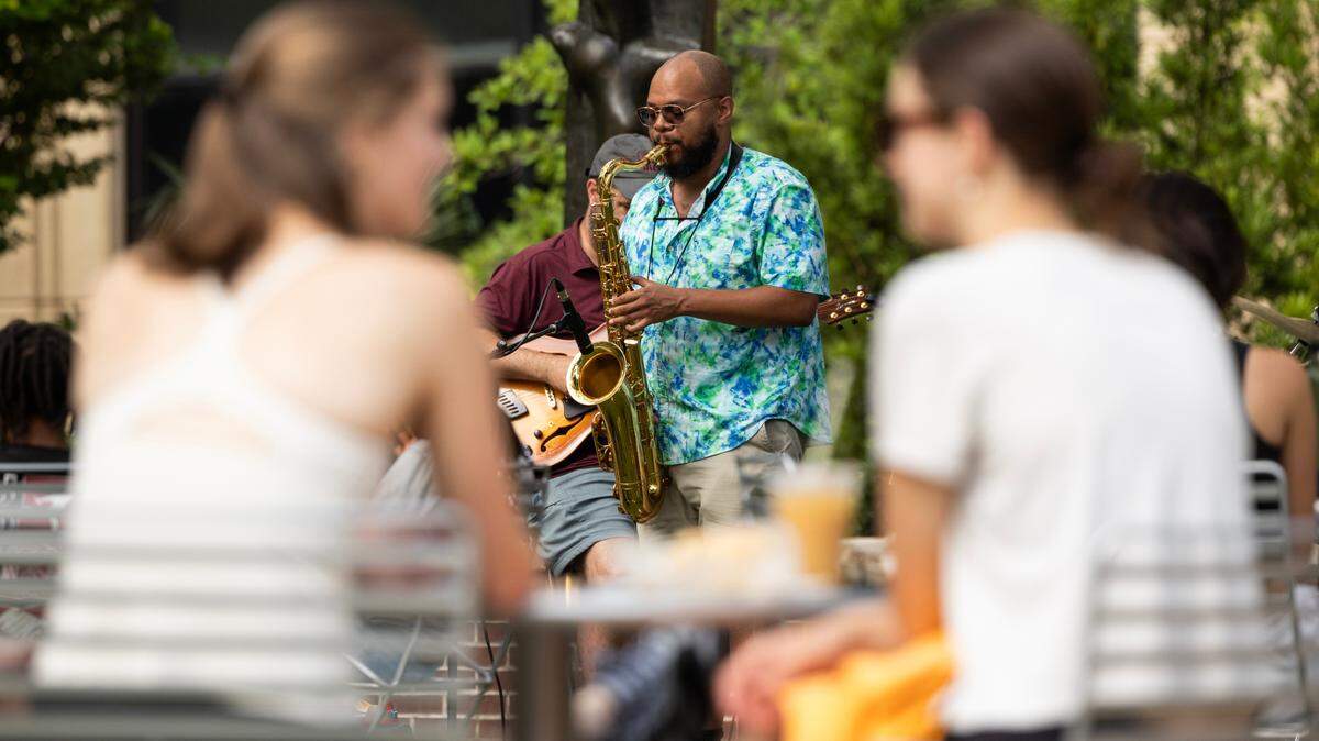 People talk, drink coffee, work on their computers and listen to music during Morning Blend: A Jazz, Soul, and Coffee Series, at the Columbia Museum of Art on Wednesday, June 26, 2024.