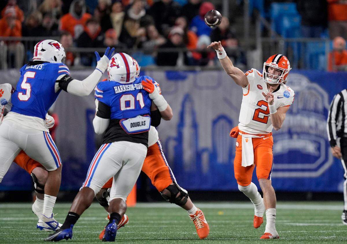 Clemson Tigers quarterback Cade Klubnik (2) throws during the first quarter against the Southern Methodist Mustangs in the 2024 ACC Championship game at Bank of America Stadium.