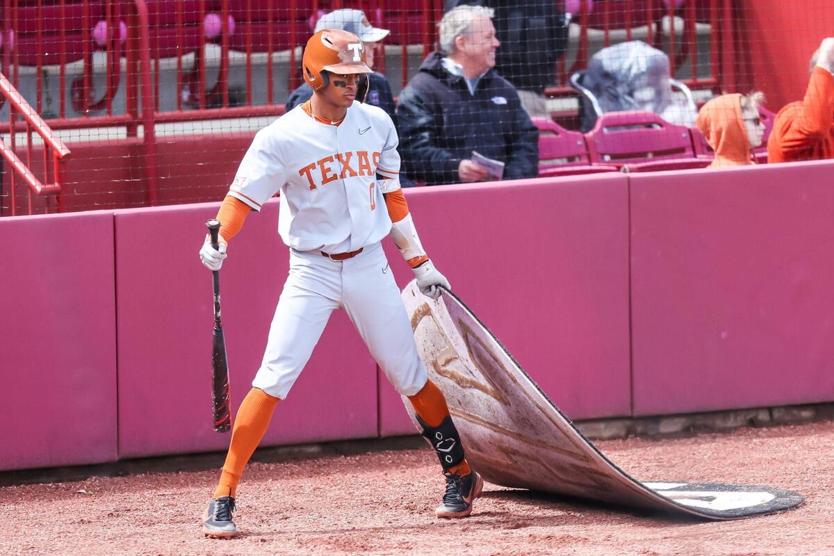 Texas Longhorns infielder Trey Faltine (0) moves the on-deck circle during their game against the South Carolina Gamecock at Founders Park Saturday, March 12, 2022.
