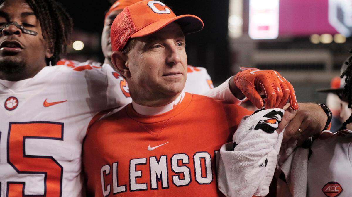 Clemson head coach Dabo Swinney celebrates defeating South Carolina at Williams-Brice Stadium on Saturday, November 27, 2021.