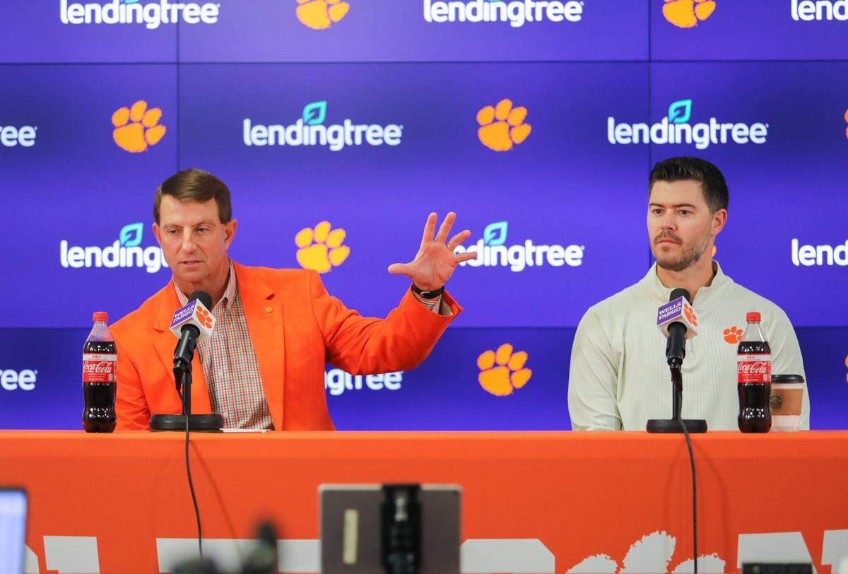 Clemson head coach Dabo Swinney speaks to the media alongside offensive coordinator Garrett Riley February 1st, 2023 in Clemson, South Carolina.