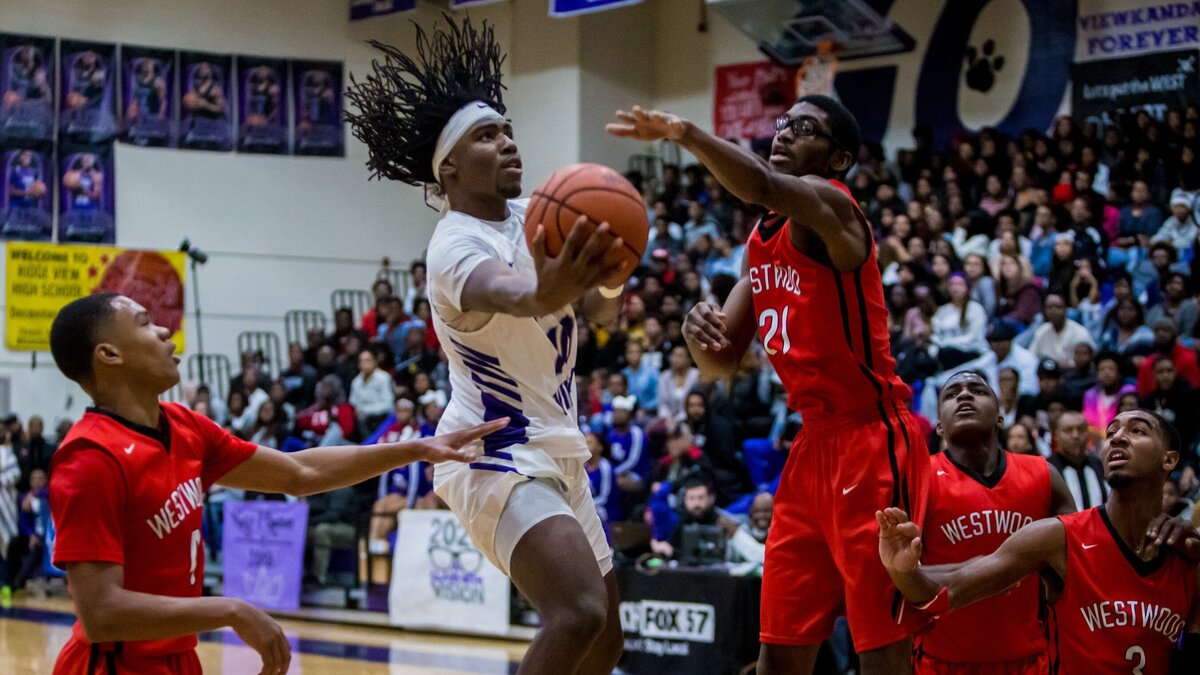 Ridge View Blazers Cincere Scott (10) drives the basket against the Westwood Redhawks.