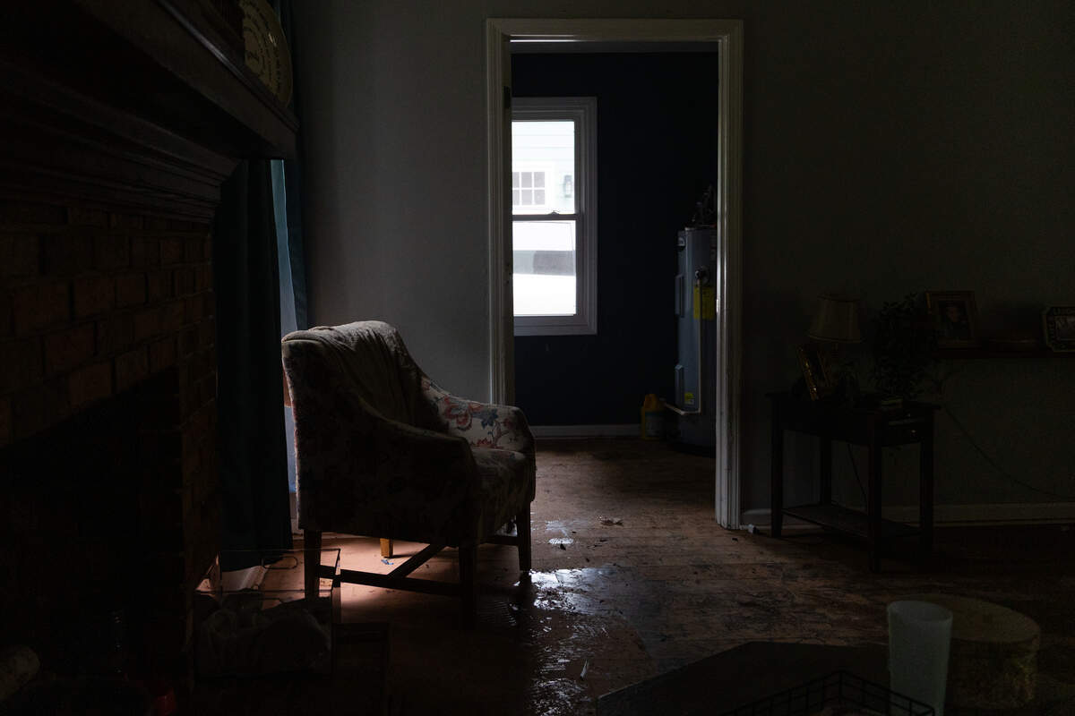Laura Easley Hayes shows her flood damaged home in Irmo, South Carolina on Wednesday, May 27, 2026. She says the wave of water came suddenly, and not from Hope Creek that runs behind her house.
