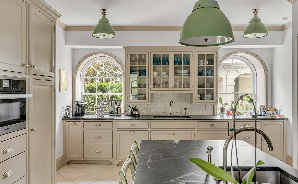 The Ravenel house kitchen has high-end appliances and a soapstone center island.