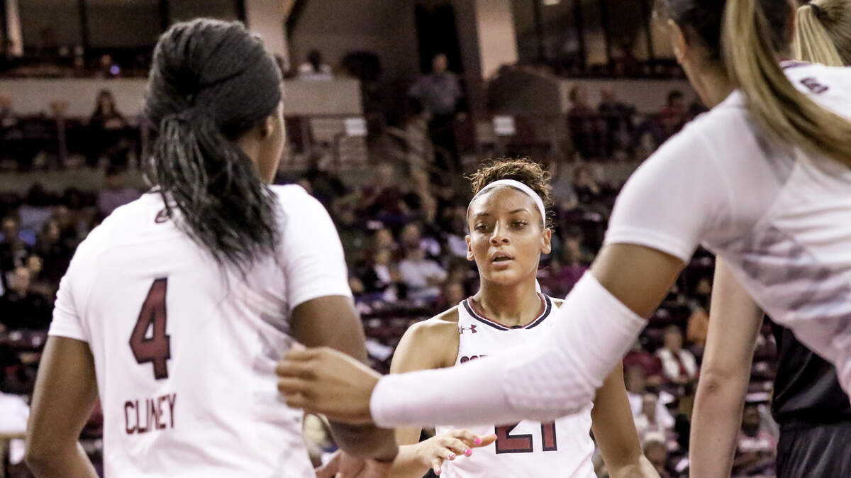 South Carolina’s Mikiah Herbert Harrigan (21), Doniyah Cliney (4) and Alexis Jennings (35) gather on court while playing Baylor in the Colonial Life Arena. 12/2/18