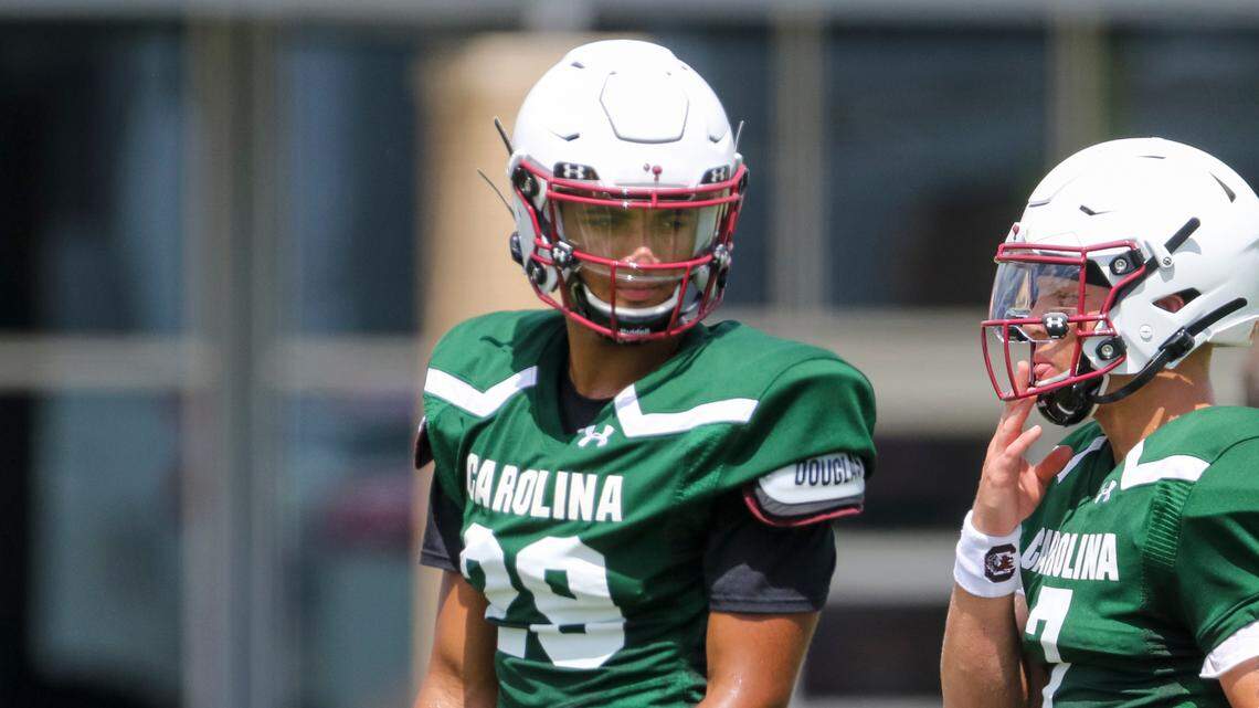 University of South Carolina quarterback Spencer Rattler (7) and Jalen Daniels (29) practice drills during practice on Monday, Aug. 8, 2022.