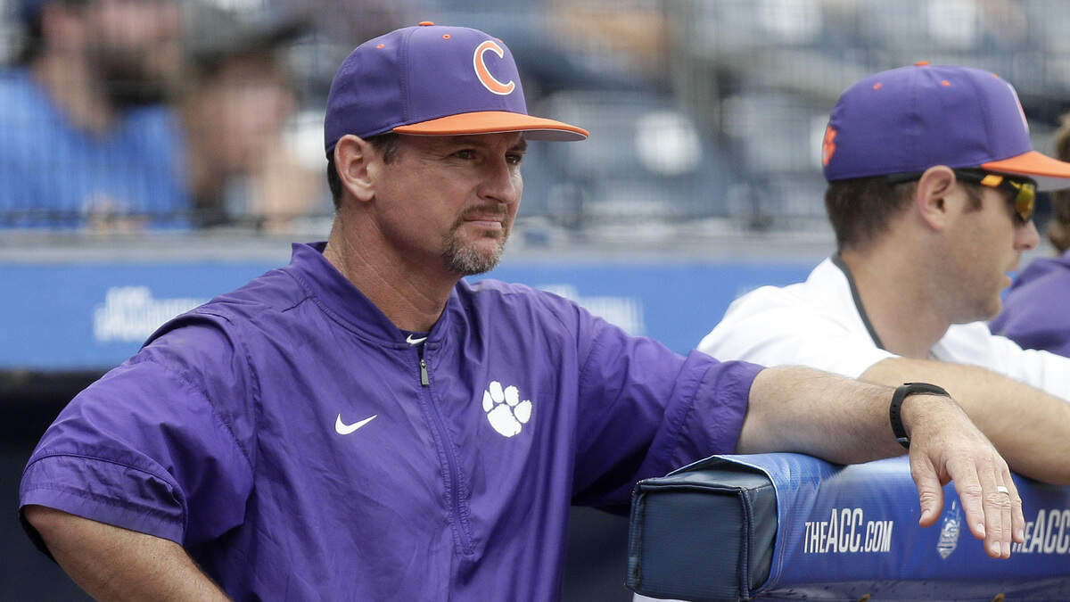 Clemson coach Monte Lee watches from the dugout during the second inning of an Atlantic Coast Conference NCAA college baseball tournament semifinal against Florida State in Durham, N.C., Saturday, May 26, 2018. (AP Photo/Gerry Broome)