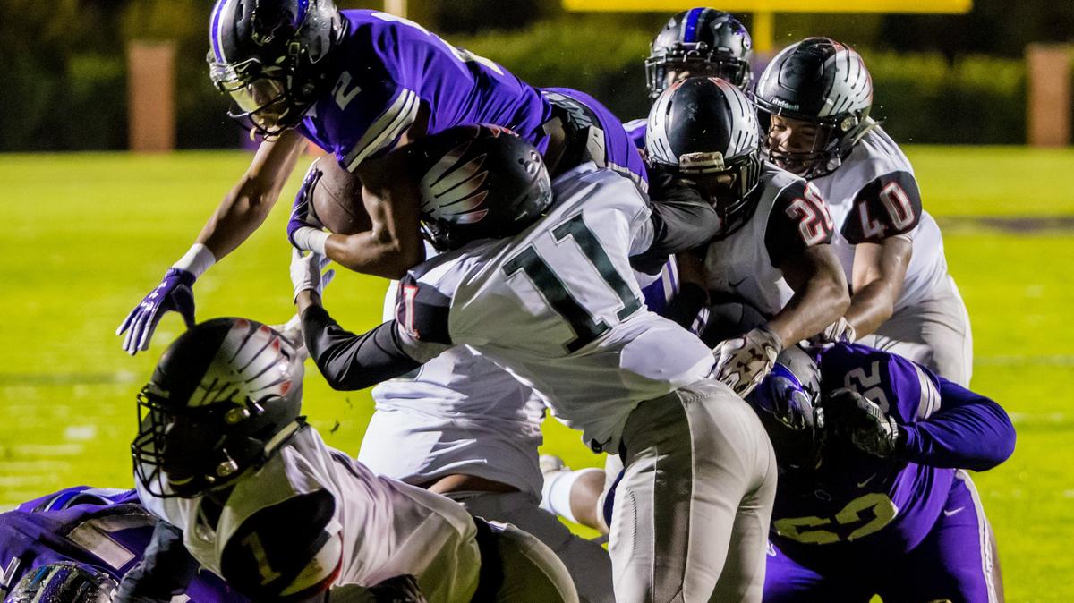 Ridge View Blazers Walyn Napper (2) attempts to dive over the goal line against the Westwood Redhawks during their second-round playoff matchup.