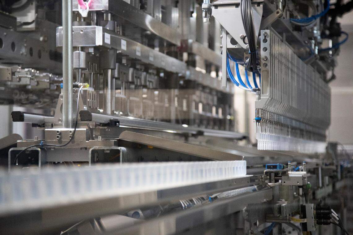 Sodium Chloride is packaged at Nephron Pharmaceuticals on Thursday, March 17, 2022. The high level of automation allows for the pharmaceutical company to switch between packaging multiple kinds of medicine.