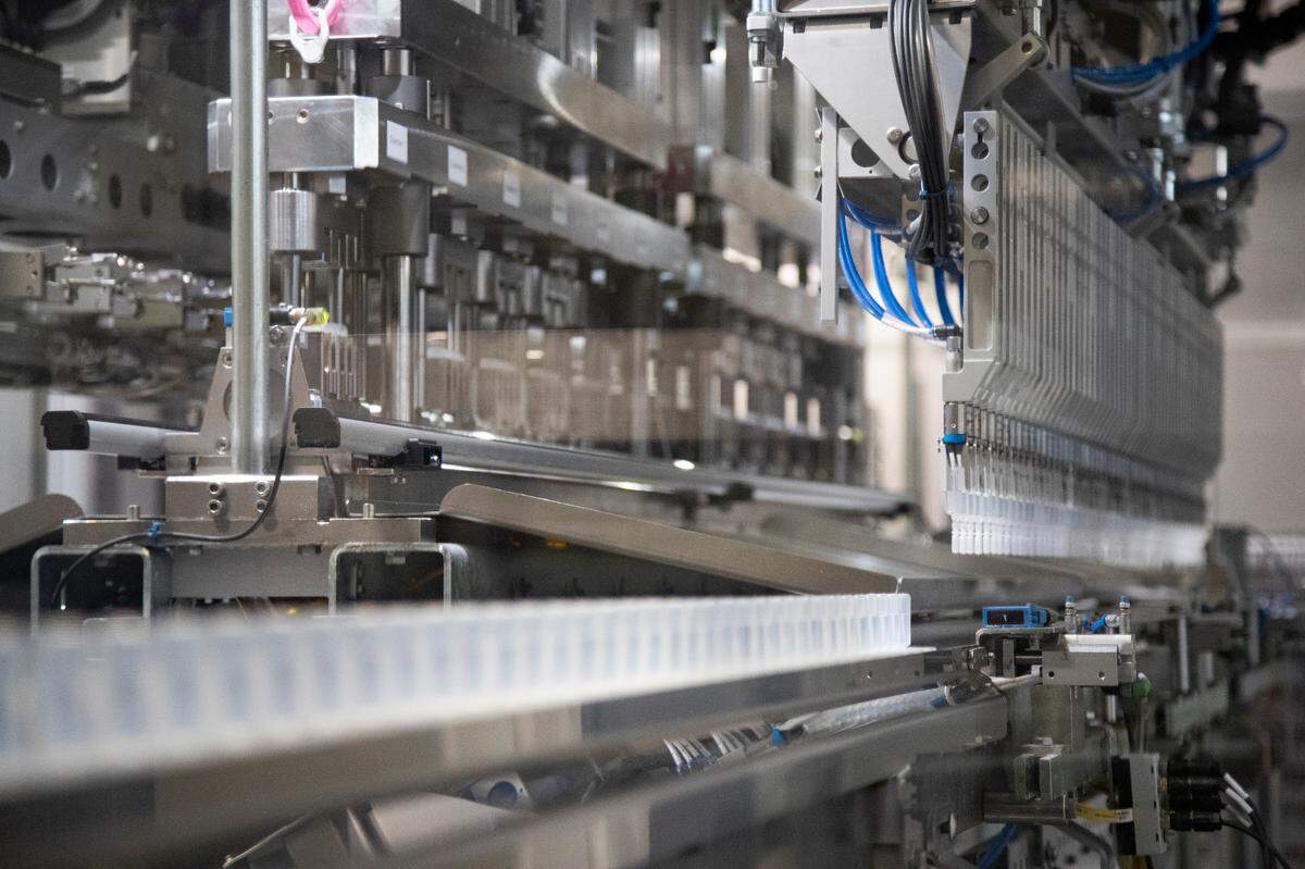 Sodium Chloride is packaged at Nephron Pharmaceuticals on Thursday, March 17, 2022. The high level of automation allows for the pharmaceutical company to switch between packaging multiple kinds of medicine.