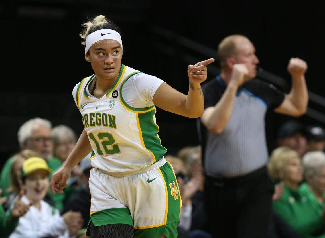 Oregon’s Te-Hina Paopao points to her teammates after sinking a 3-point shot against Rice during the first half of an 2023 WNIT Second Round game in Eugene. Ncaa Womens Basketball Uo Wbb In Nit Rice At Oregon