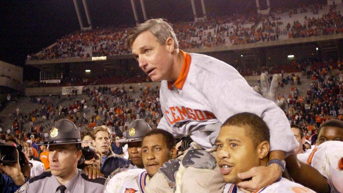Clemson head coach Tommy Bowden is carried off the field after the Tigers’ 63-17 victory in 2003 over South Carolina at Williams-Brice Stadium.