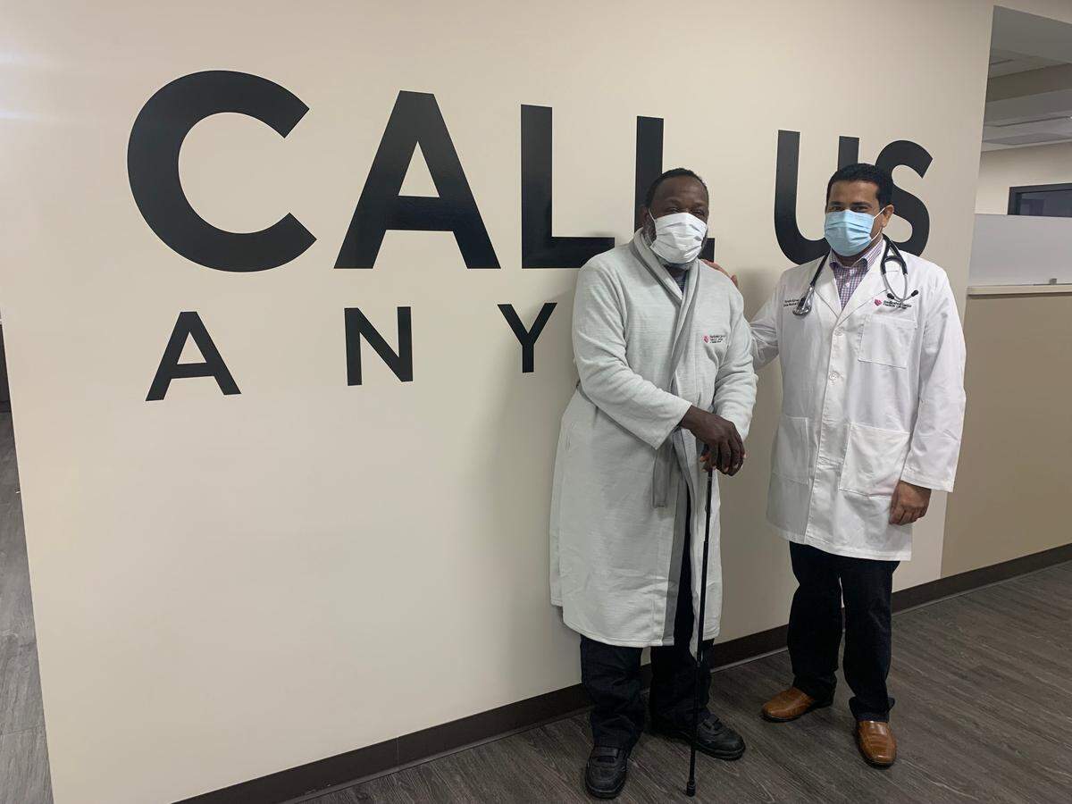 Dr. Haresh Kumar stands with Avery Crosby, the third patient of the day at North Main Street’s new Dedicated Senior Medical Center, which opened Feb. 13.
