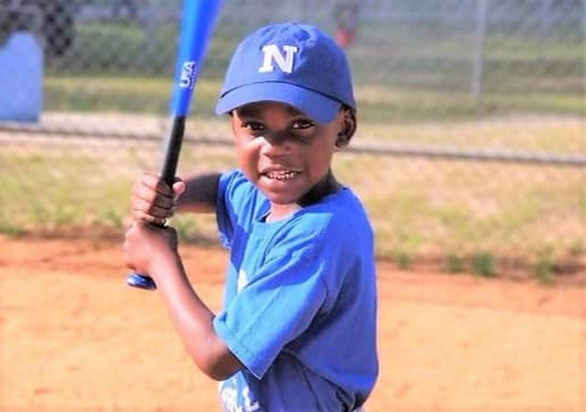 Winston Hunter, 6, was killed when his house was hit by a barrage of gunfire, the solicitor’s office said.