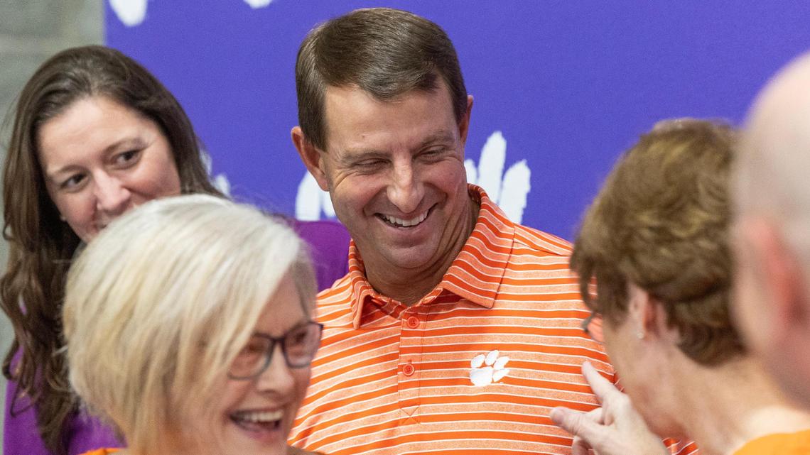 Clemson head football coach Dabo Swinney and other sports staff pose for pictures with fans at Clemson Prowl and Growl on Wednesday, April 19, 2023.