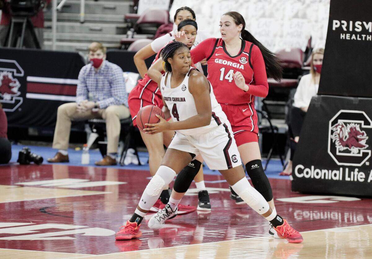 South Carolina Gamecocks forward Aliyah Boston (4) is defended by Georgia Lady Bulldogs center Jenna Staiti (14) at Colonial Life Arena on Thursday, January 21, 2021.