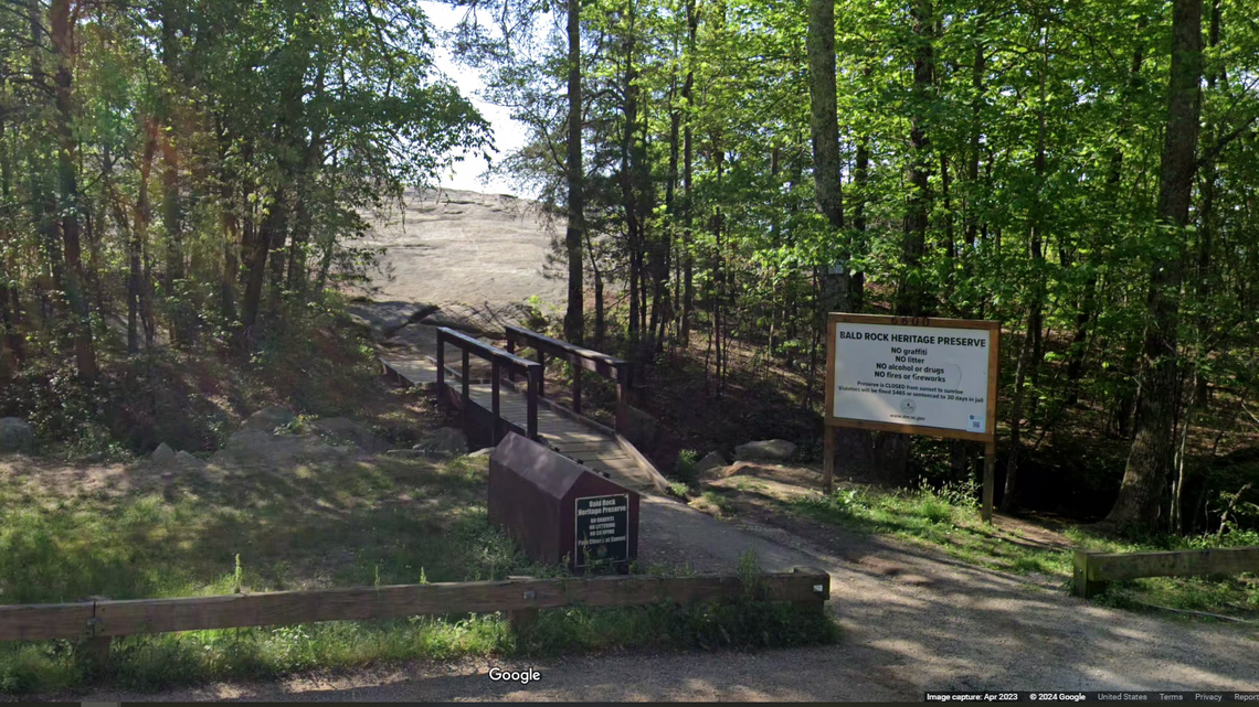 One person was killed and a second person was wounded by gunfire near a popular mountain overlook inside Bald Rock Heritage Preserve in Upstate South Carolina, investigators say.