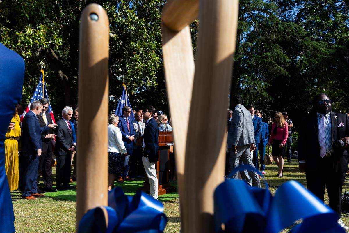 State lawmakers line up for a ceremonial groundbreaking of the new Robert Smalls statue coming to the South Carolina State House on Wednesday, May 13, 2026. Smalls was enslaved at birth in Beaufort, South Carolina, and freed himself by commandeering a Confederate Navy vessel he was forced to captain. After the Civil War, he served in the South Carolina and national legislature.