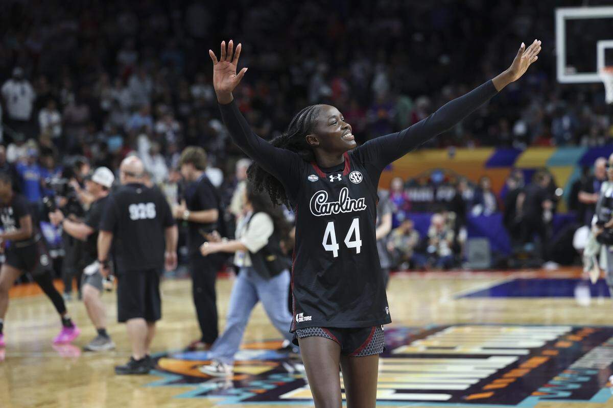 South Carolina's Agot Makeer (44) celebrates beating UConn and advancing to the National Championship game at Mortgage Matchup Center in advance of the Final Four matchup between South Carolina and UConn in Phoenix on Friday, April 3, 2026.