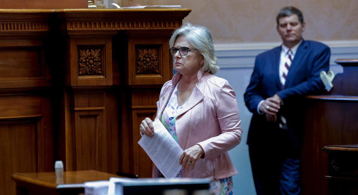 Sen. Katrina Shealy, R-Lexington walks through the senate chamber on Wednesday April 26, 2023 in the South Carolina State House.