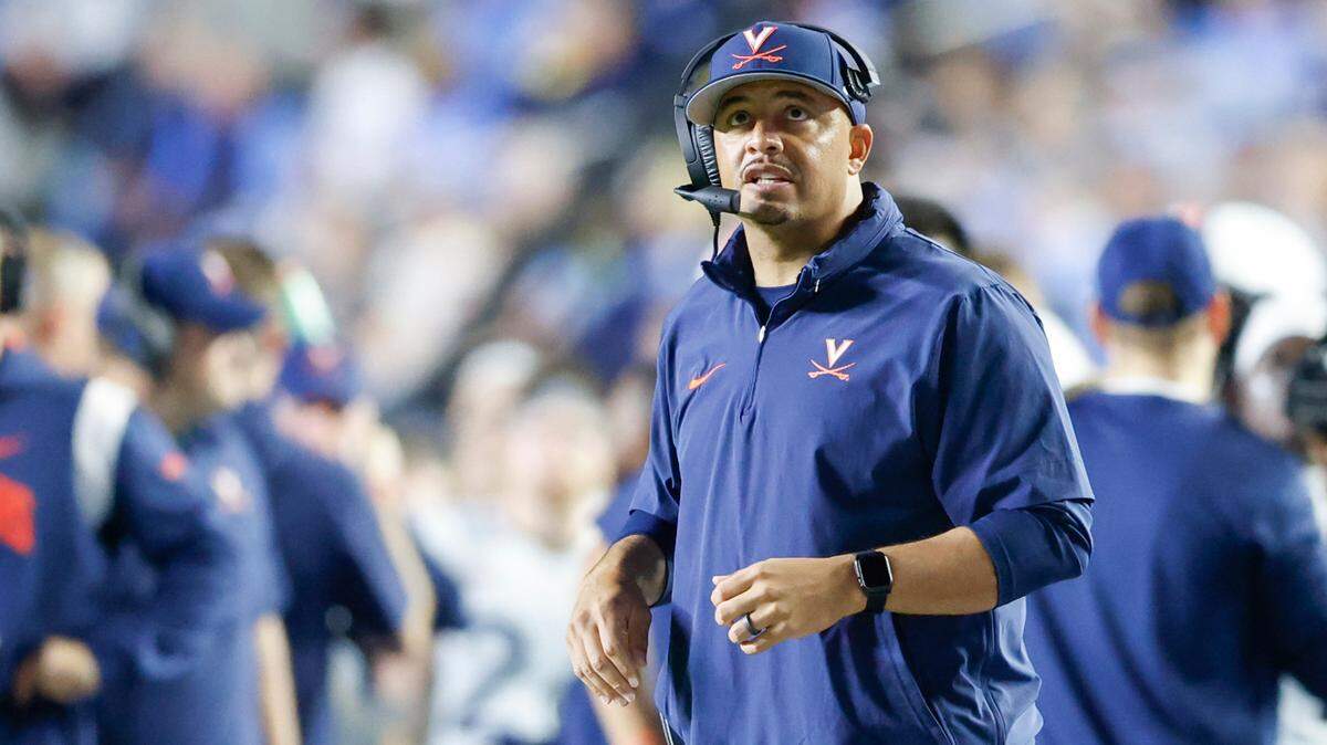 Oct 21, 2023; Chapel Hill, North Carolina, USA; Virginia Cavaliers head coach Tony Elliott watches as his team plays against the North Carolina Tar Heels in the first half at Kenan Memorial Stadium.