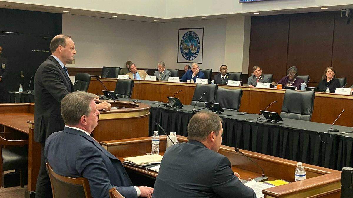 S.C. Attorney General Alan Wilson speaks before members on a special committee charged with studying judicial reform. Seated to the right of Wilson are Solicitors Kevin Brackett and David Pascoe of the 16th and 1st Judicial Circuits, respectively.