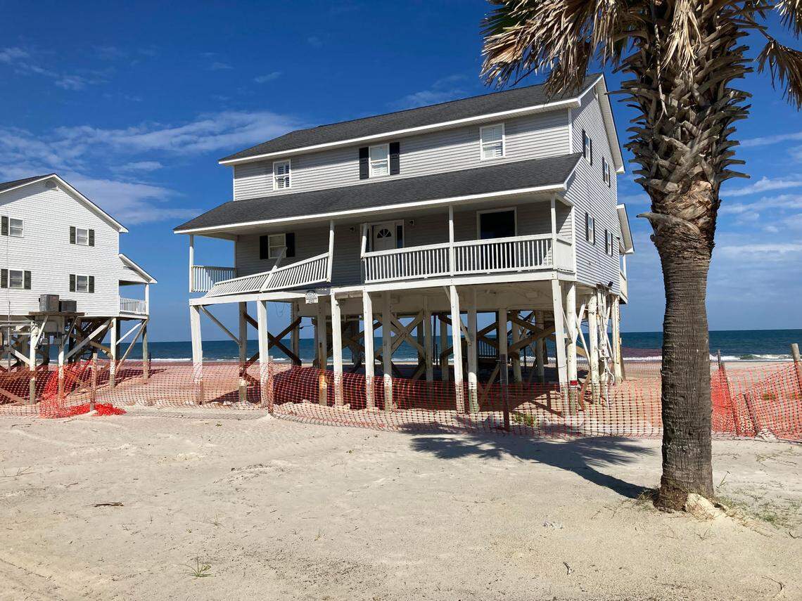 This home on the southern tip of Garden City, SC, has been undermined by the ocean as the beach erodes. (July 2024)