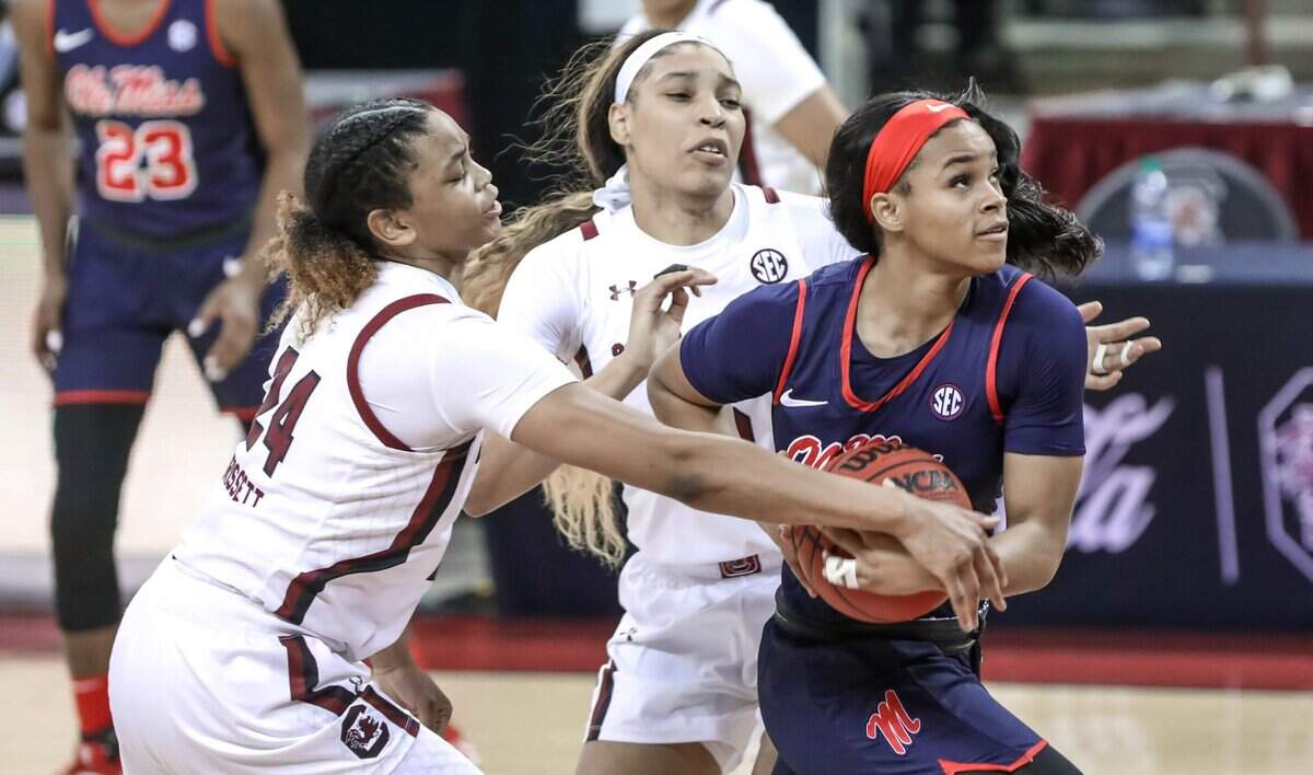 South Carolina Gamecocks guard LeLe Grissett (24) pressures Ole Miss guard Donnetta Johnson (3) during the second half of action at the Colonial Life Arena in Columbia, S.C.