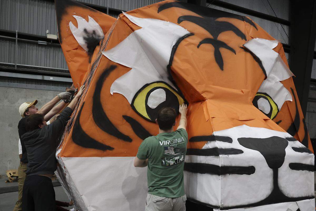 USC engineering students and members of the American Society of Mechanical Engineers (ASME) work on the tiger head while finishing the 30-foot effigy of a Clemson Tiger on Monday, Nov. 17, 2025. The tiger is burned at a pep rally prior to the USC vs Clemson rivalry football game.