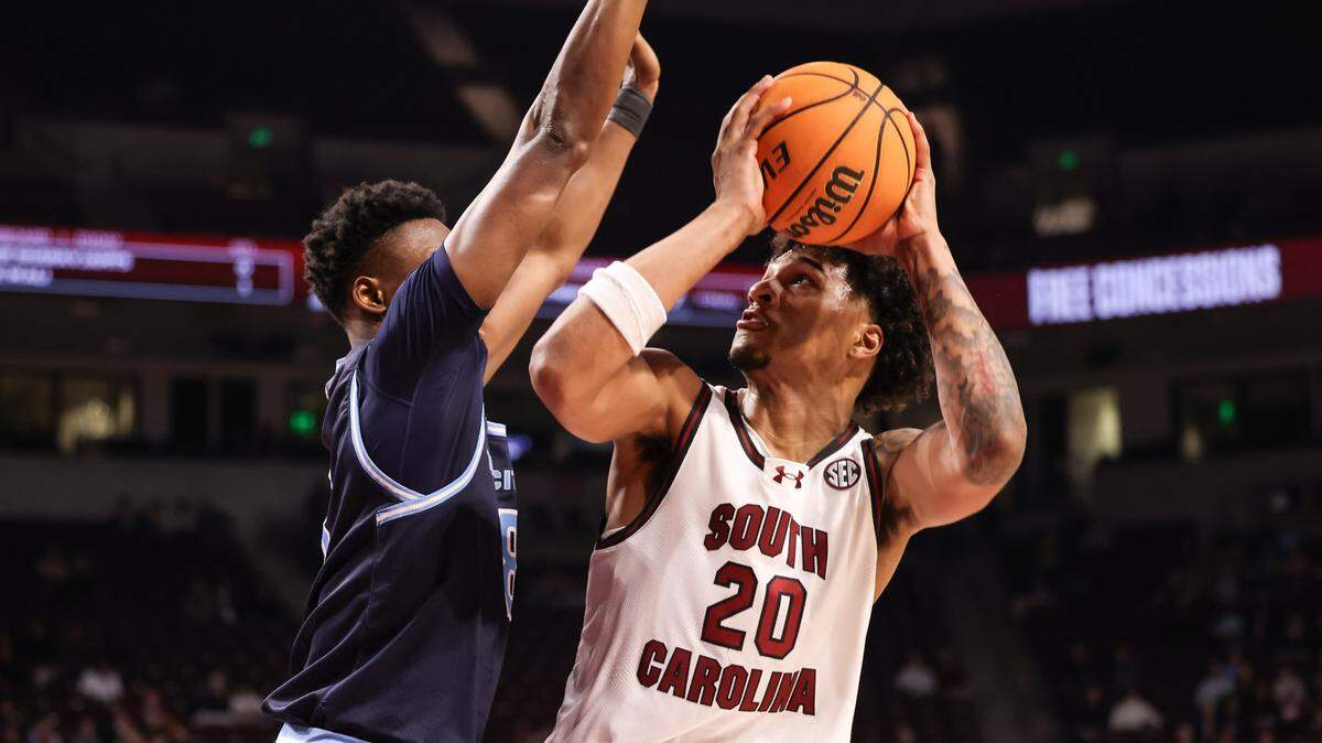 South Carolina forward Hayden Assemian (20) is guarded by The Citadel forward Sola Adebisi (8) during the Gamecocks’ game against The Citadel at Colonial Life Arena in Columbia on Saturday, December 13, 2025.


