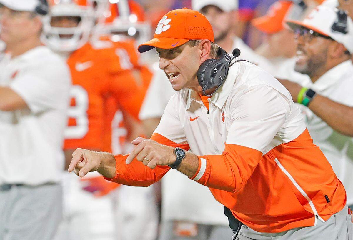 Clemson head coach Dabo Swinney talks to his team during first-half action against Stanford in Clemson, S.C. on Saturday, Sept. 28, 2024.