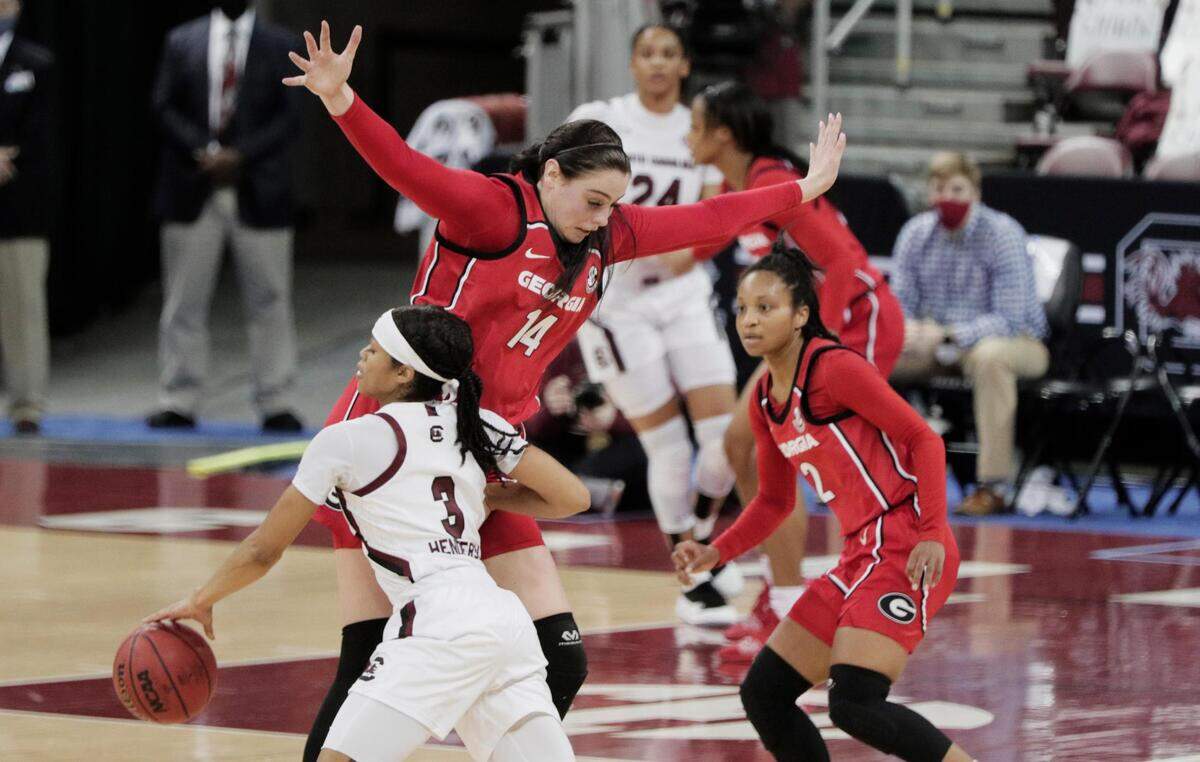 Georgia Lady Bulldogs center Jenna Staiti (14) guards South Carolina Gamecocks guard Destanni Henderson (3) at Colonial Life Arena on Thursday, January 21, 2021.