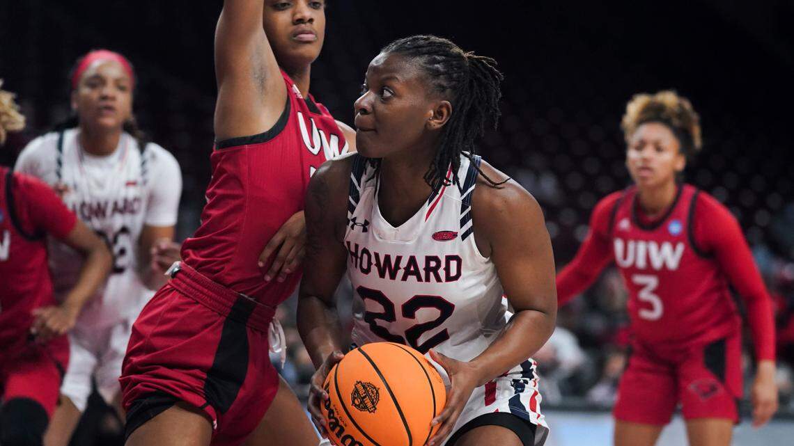 Howard forward Kaiya Creek (22) looks for a shot against Incarnate Word forward Jamie Means, left, during the first half of a First Four game in the NCAA women’s college basketball tournament Wednesday, March 16, 2022, in Columbia, S.C. (AP Photo/Sean Rayford)