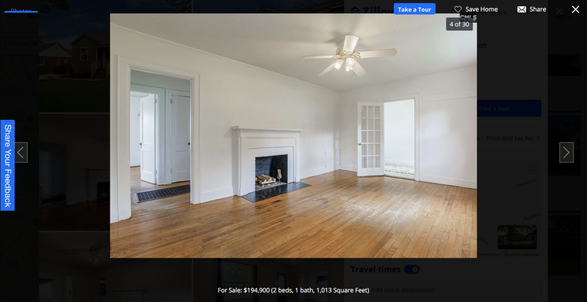 The home is freshly painted, includes a fireplace and has a large back yard with a shed.