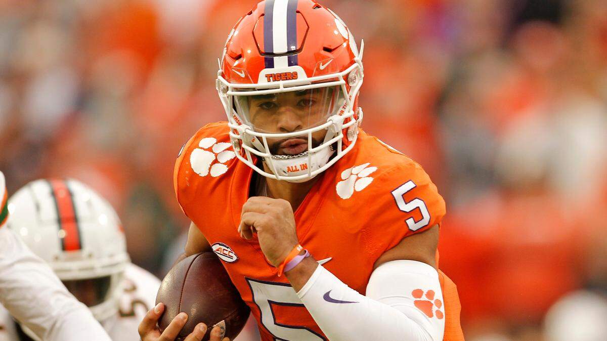Clemson quarterback DJ Uiagalelei (5) runs for a touchdown against Miami during first-quarter action in Clemson, S.C. on Saturday, Nov. 19, 2022.
