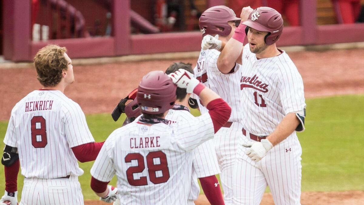 South Carolina Gamecocks outfielder Andrew Eyster (11) celebrates a grand slam during the fourth inning. South Carolina vs. Dayton Baseball, Feb. 19, 2021, Founders Park, Columbia, SC. Photo by Jeff Blake
