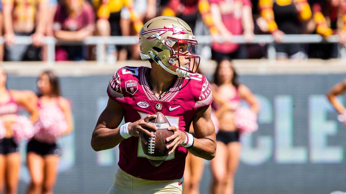 Florida State quarterback Jordan Travis (13) passes in the first half of an NCAA college football game against Massachusetts in Tallahassee, Fla., Saturday, Oct. 23, 2021. (AP Photo/Mark Wallheiser)
