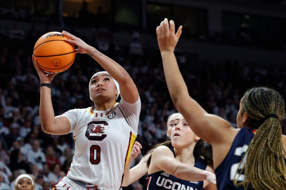 South Carolina’s Te-Hina Paopao (0) shoots over UCONN during the second half of action in the Colonial Life Arena on Sunday, Feb. 11, 2024