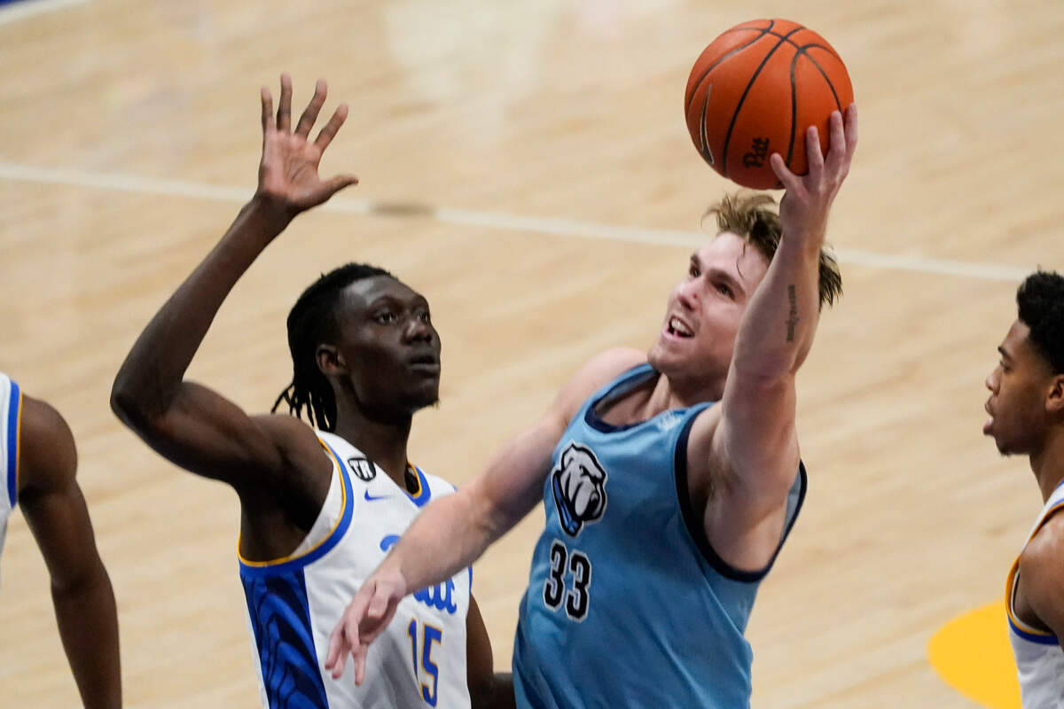 Citadel’s Hayden Brown (33) shoots as Pittsburgh’s Mouhamadou Gueye (15) defends during the second half of an NCAA college basketball game, Tuesday, Nov. 9, 2021, in Pittsburgh. Citadel won 78-63.