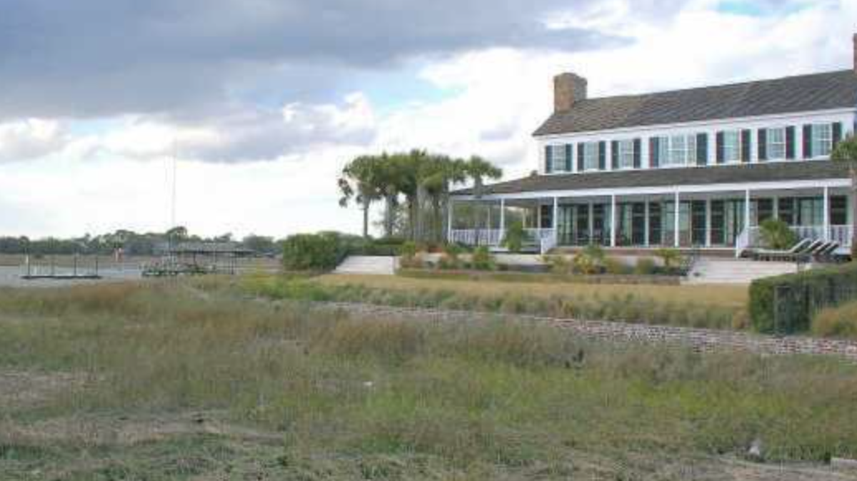 The three story house has five bedrooms and views of Charleston harbor, Charleston skyline,, Fort Sumter and Sullivans Island,.