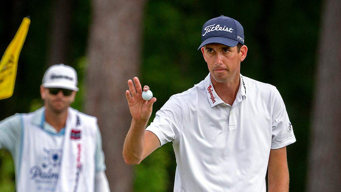 Chesson Hadley waves to the crowd after making a birdie putt on the 12th hole during the third round of the Palmetto Championship golf tournament in Ridgeland, S.C., Saturday, June 12, 2021. (AP Photo/Stephen B. Morton)