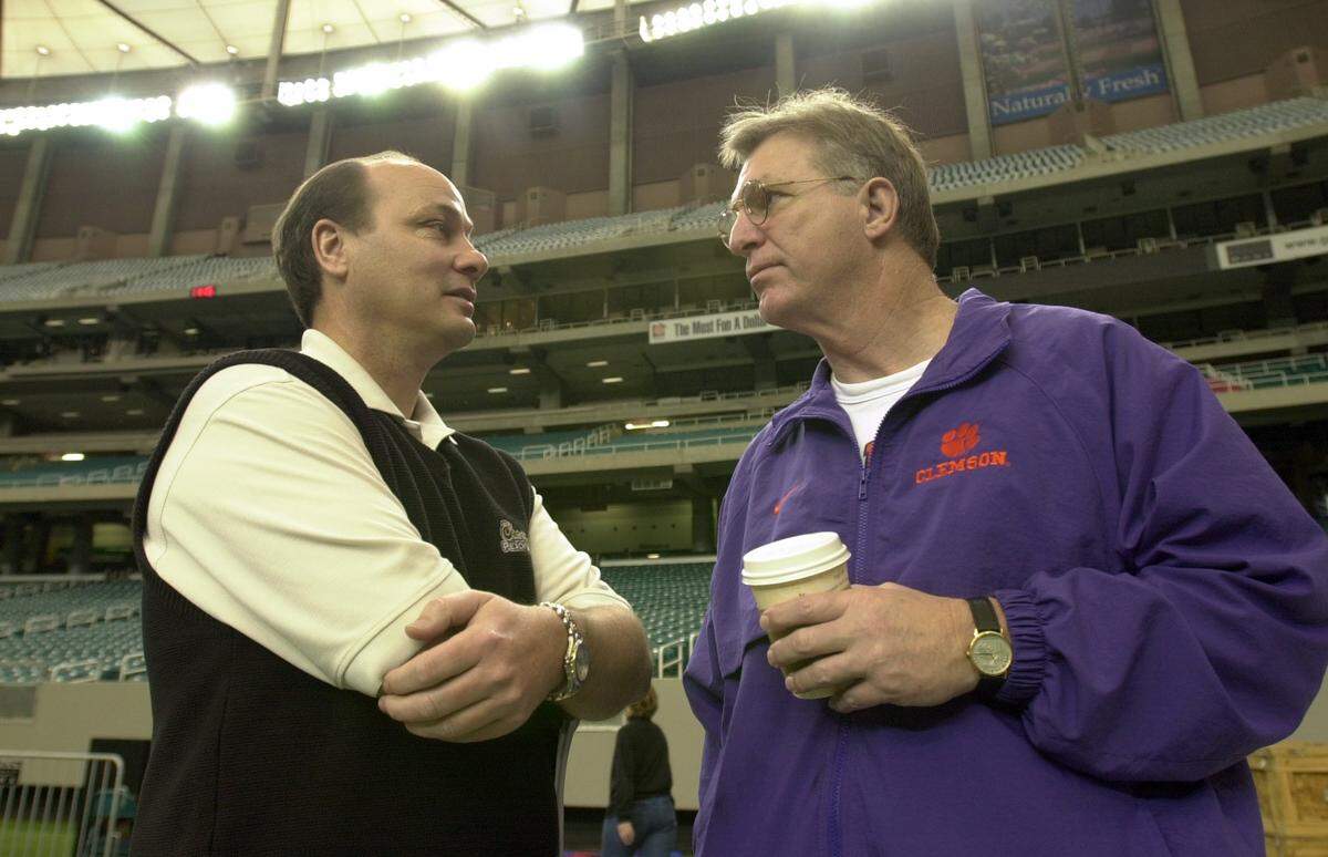 Clemson athletic director Terry Don Phillips (right) with Peach Bowl president Gary Stokan (left) ahead of the 2003 Peach Bowl