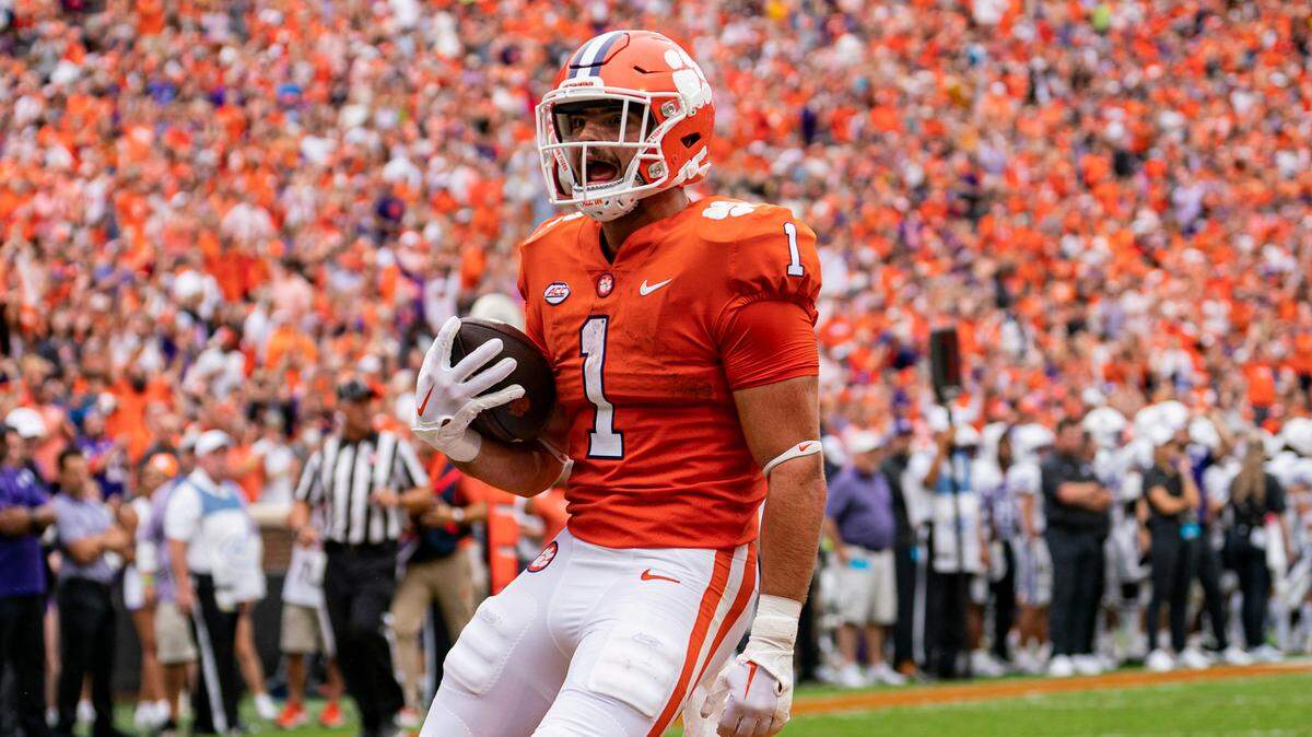 Clemson Tigers running back Will Shipley reacts after scoring a touchdown in the second quarter during an NCAA college football game against the Furman Paladins in Clemson, S.C., Saturday, Sept. 10, 2022. (AP Photo/Jacob Kupferman)
